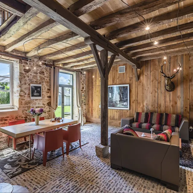 Villa Le Pavillon Grande pièce à vivre avec cheminée