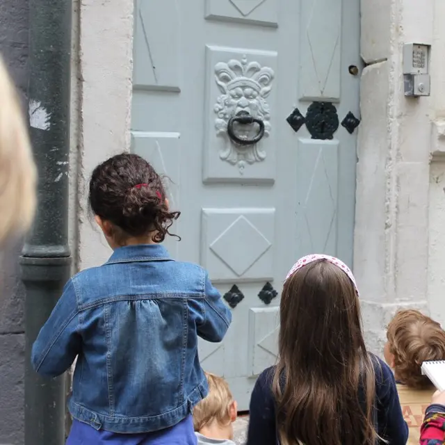 DE PORTE EN PORTE