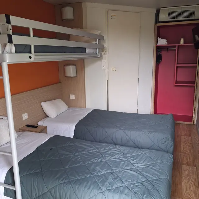 Chambre 3 lits simples