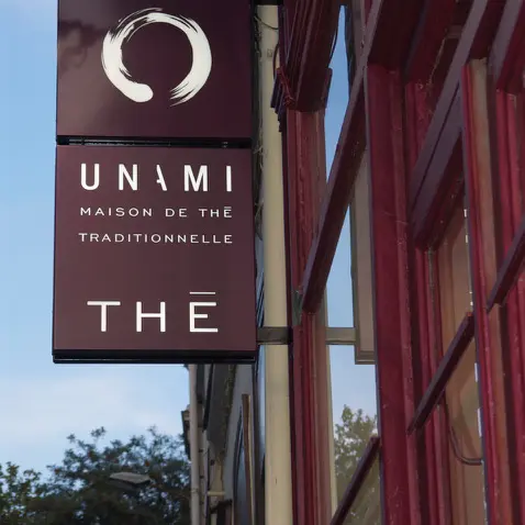 Unami - Enseigne