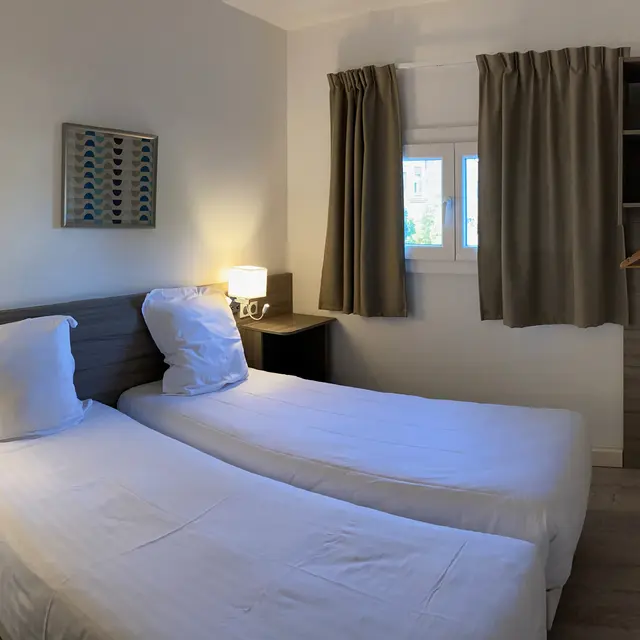 Chambre 2 lits simples