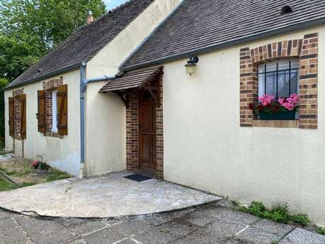 Maison au bord d'un ruisseau