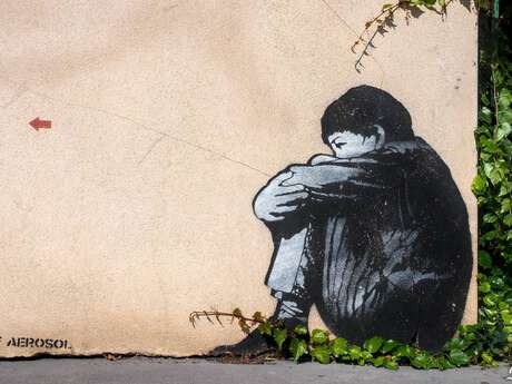 STREET ART - THE SITTING KID