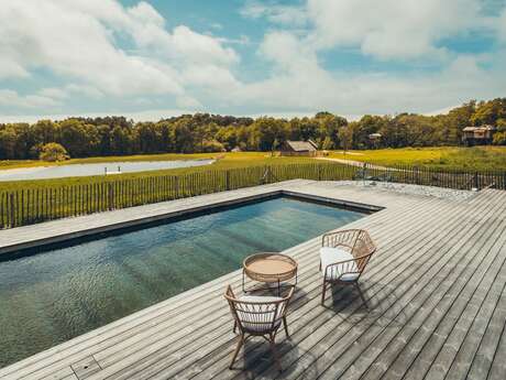 Dihan - Hôtel de cabanes