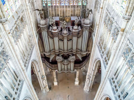 Experience the magic of the grand organ at Saint-Ouen Abbey