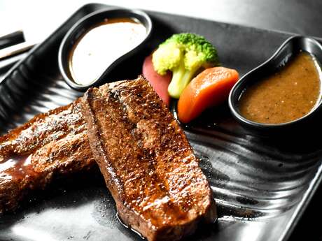 Repas côte de bœuf au braséro