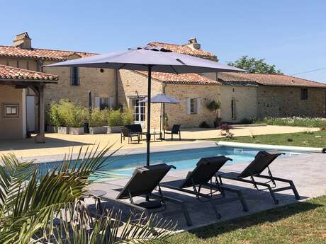 Chambre en pierre - Gîte Monpazier