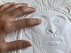 Lecture tactile des oeuvres de Sebastiao Salgao