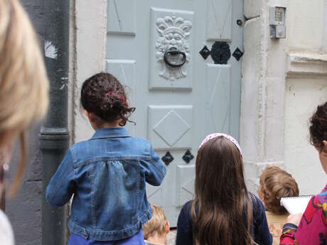 En famille « De porte en porte »