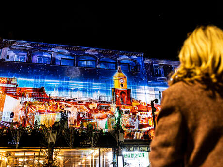 Projections son et lumière sur les façades du port