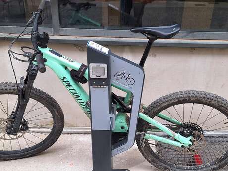 Electric bicycle charging station