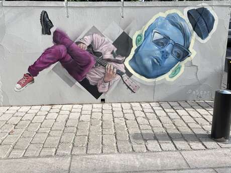 Œuvre de street art "Le guitariste"