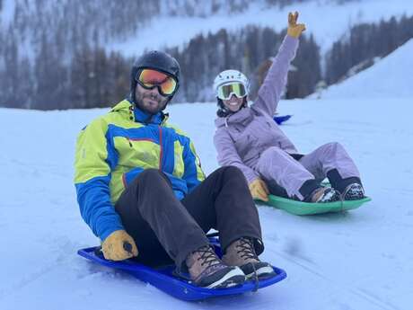 Champons downhill by sledge