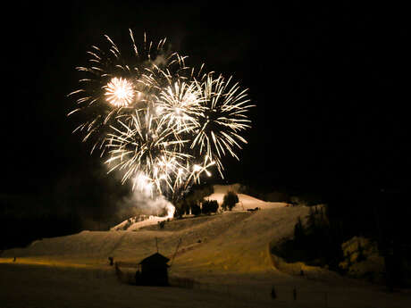 Descente aux flambeaux et feu d'artifice