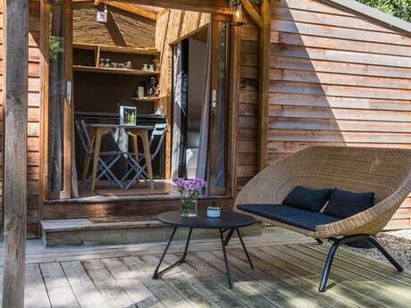 Noche en una acogedora cabaña de madera y cooconing en el bois saint-martin