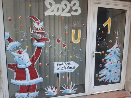 Parcours de vitrines de Noël peintes