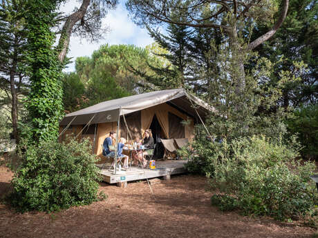 Spend a night in a converted tent at Camping Huttopia - Chardons Bleus