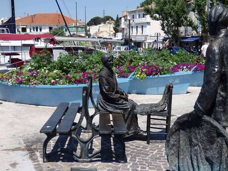 Statues de bronze Le pêcheur et la ramendeuse