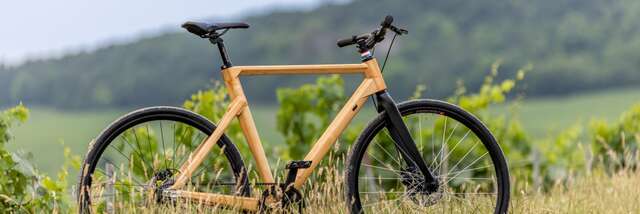 Location de Vélos en Bois à l'Office de Tourisme