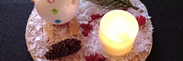 Création d'un bonhomme de neige skieur sur bois et sa bougie