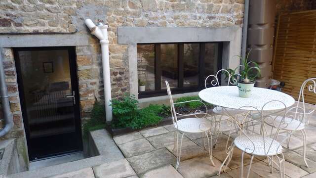 Meublé de tourisme > Maison de ville rénovée avec patio
