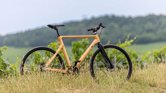 Location de Vélos en Bois à l'Office de Tourisme