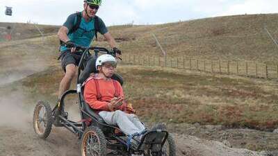 Descente fauteuil tout terrain Handisport