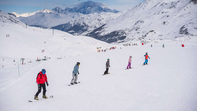 Lezioni di snowboard di gruppo per bambinni