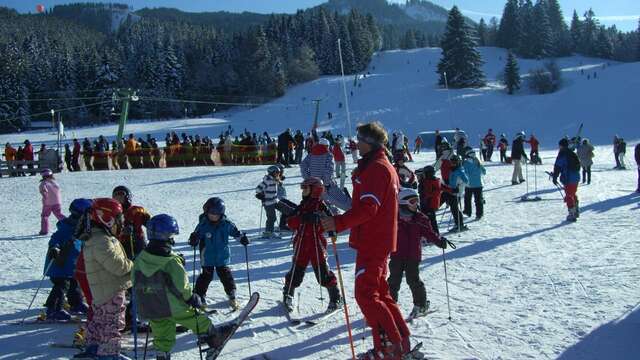 Viens skier avec un moniteur