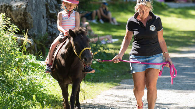 Poney riding at Montriond Lake