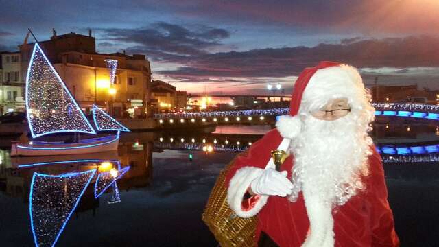 Arrivée du Père Noël en barque