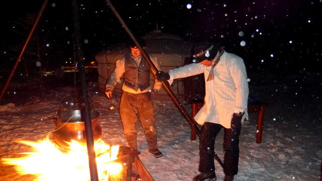 Torch-lit ski ride