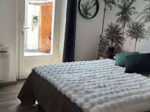 APPARTEMENT REZ DE CHAUSSÉE TOUT CONFORT AVEC JARDIN