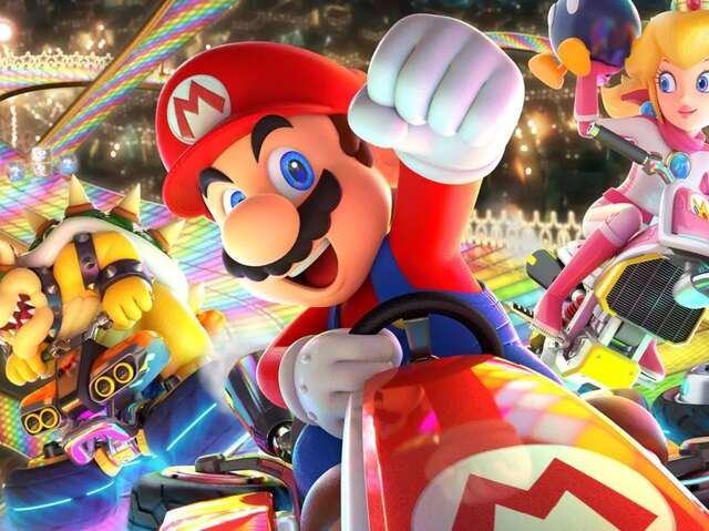 Séance de jeu sur grand écran avec Mario Kart