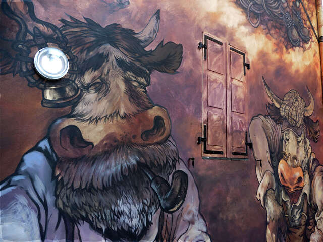 Cow Art : mural painting "The cordée from father to son"