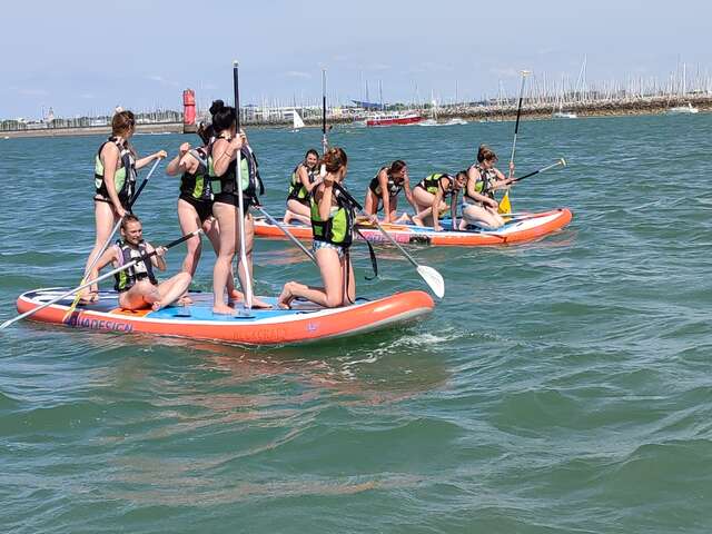 Giant paddle and boat trip