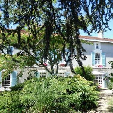 Maison Bois Fleurie