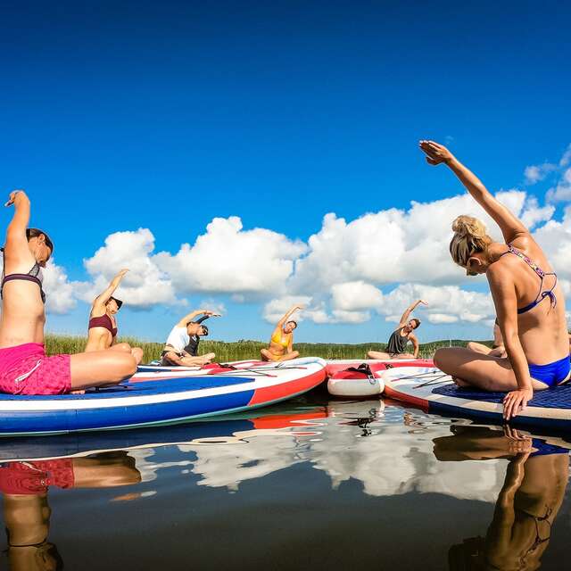 Paddle Yoga au coucher du soleil