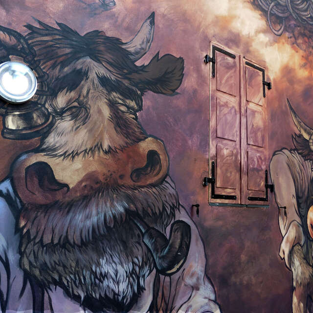 Cow Art : mural painting "The cordée from father to son"