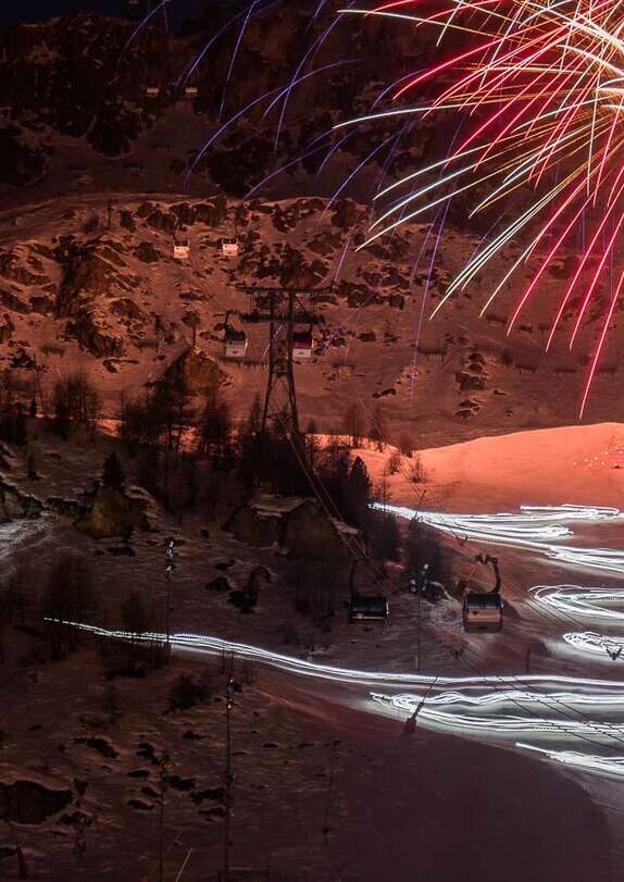 Descente aux flambeaux et feux d'artifice